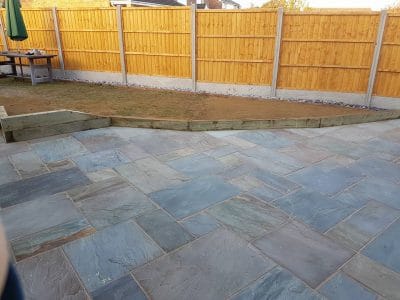 bright yellow fence installation with concrete gravel boards in corby northamptonshire
